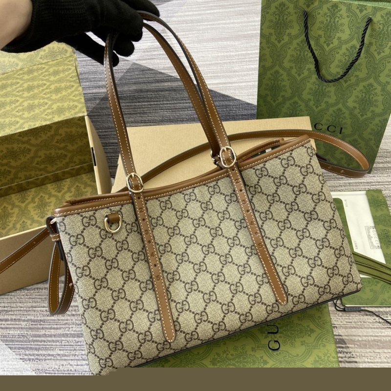 G*u*i shopping bags